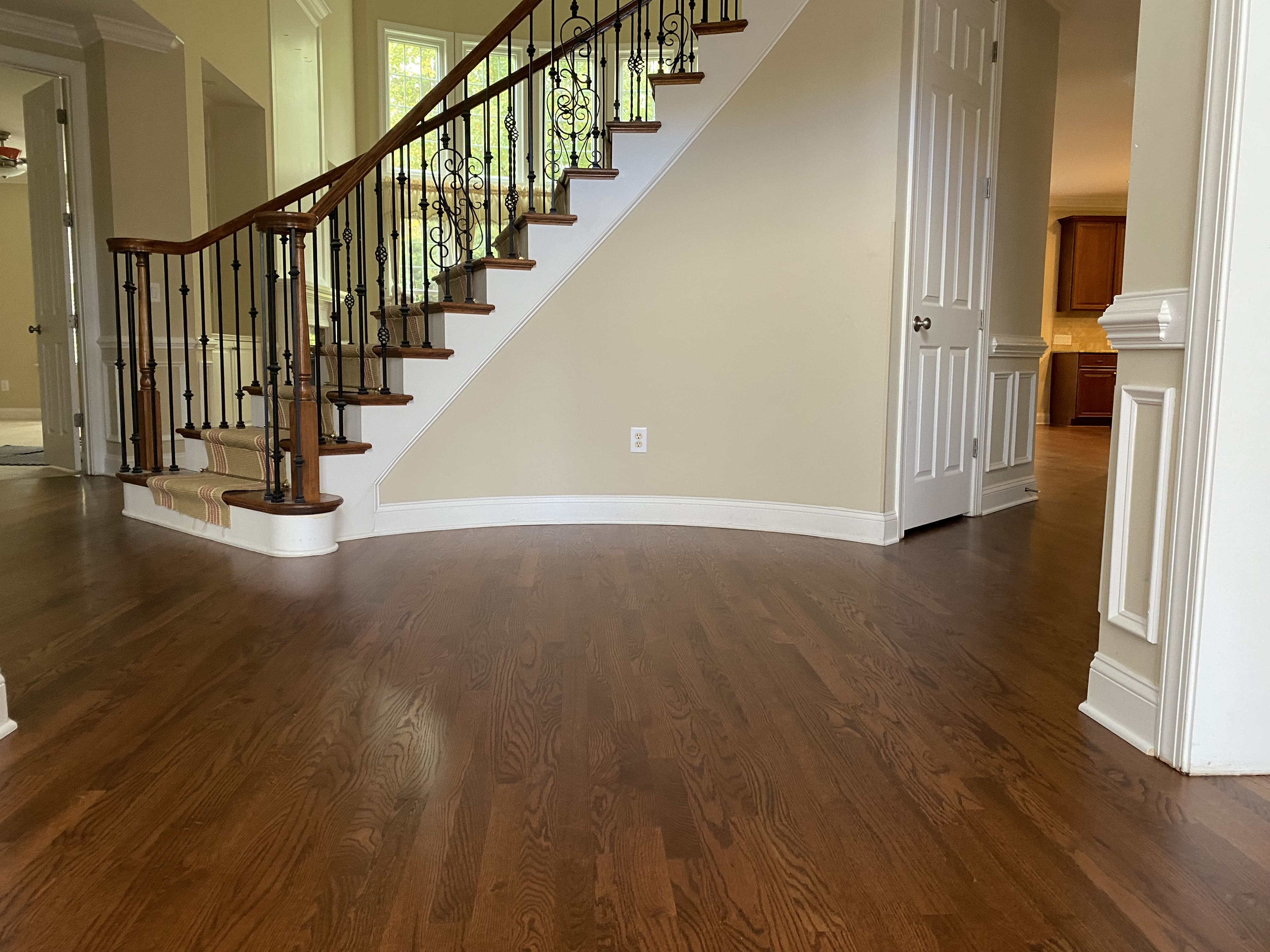Custom hardwood staircase with precision trim work